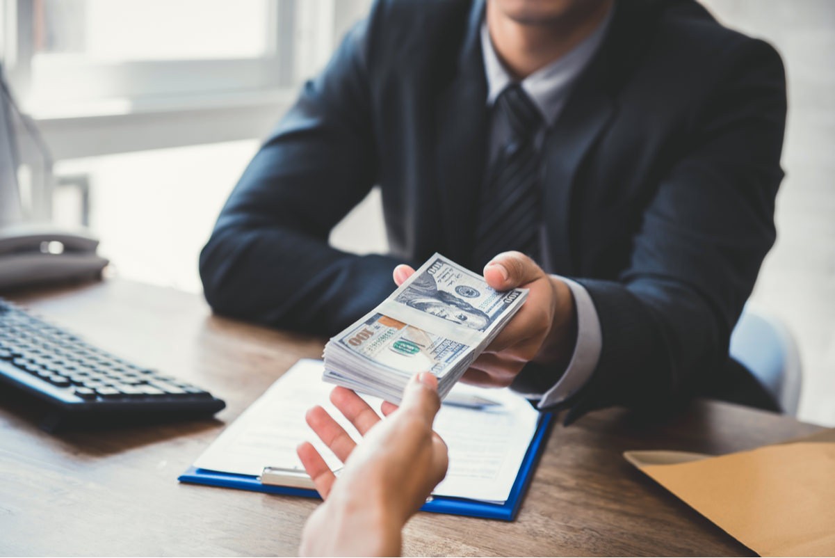 image person getting paid | accident attorney denver