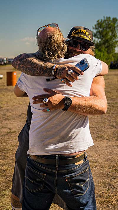 Dumptruck hugging friend at Sturgis Motorcycle Rally |  | colorado motorcyle lawyers