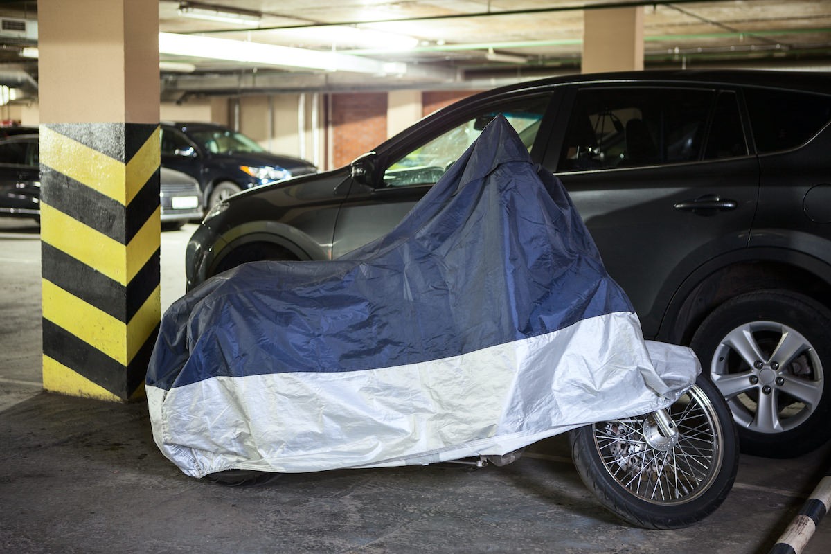 Cap your mileage on your motorcycle - motorcycle parked in garage