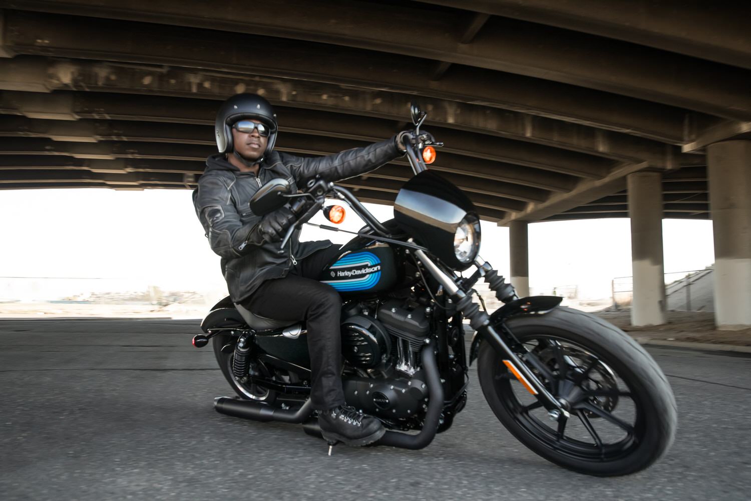 photo of man riding motorcycle accident lawyer colorado