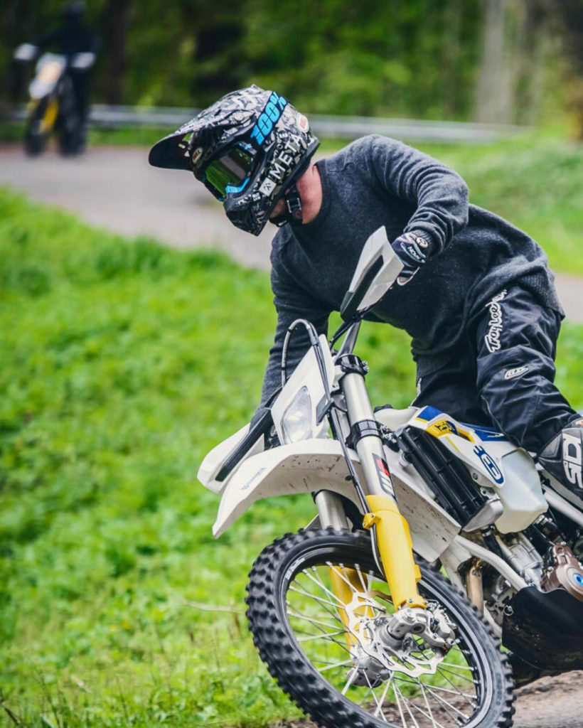Andrew Campo riding a dirt bike in Sweden