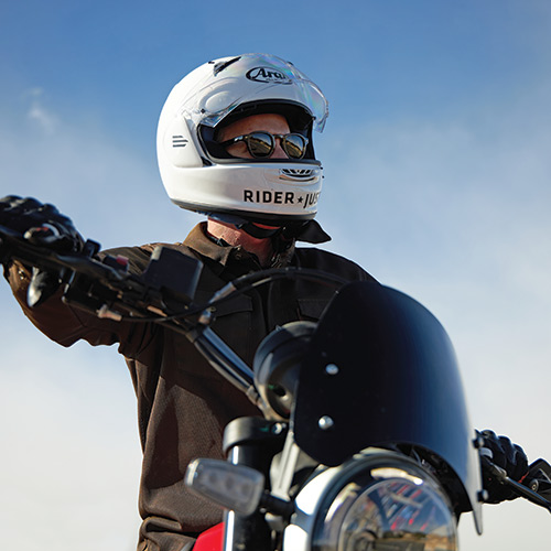 Rider Justice founder Scott O'Sullivan riding a Ducati Scrambler