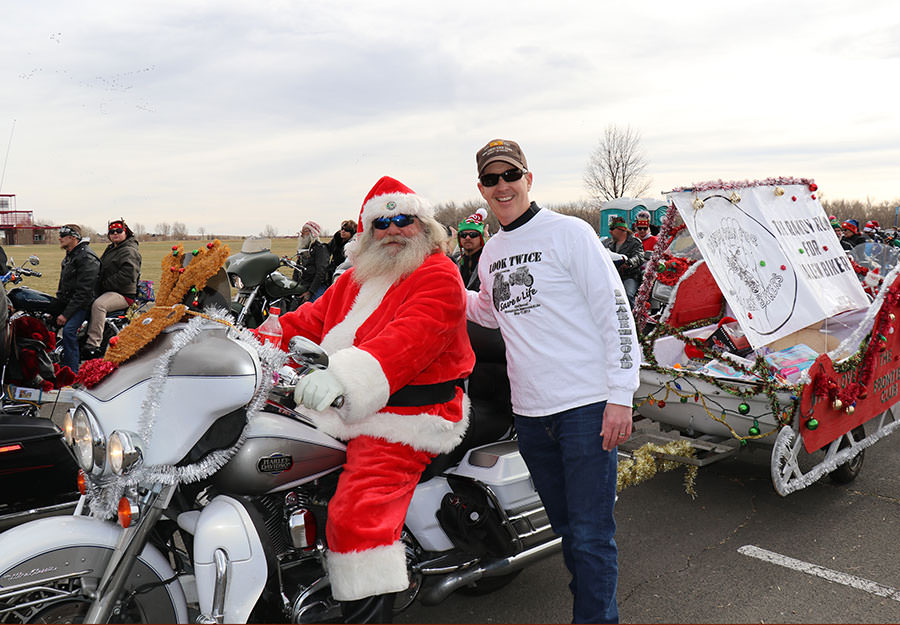  Santa (Randy Savely) and Scott O’Sullivan at the 2017 Toy Run. 