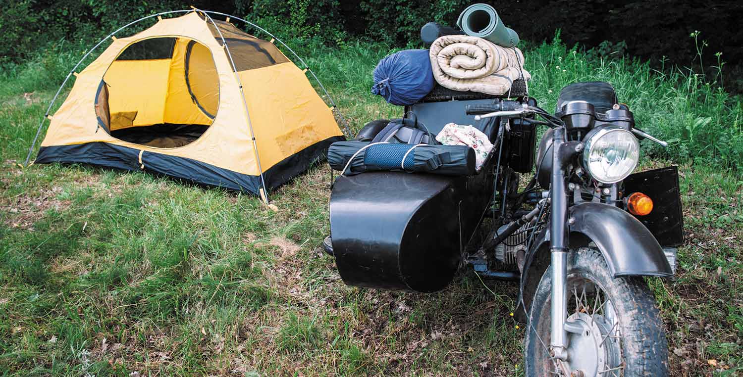 How to go motorcycle camping - tent next to motorcycle