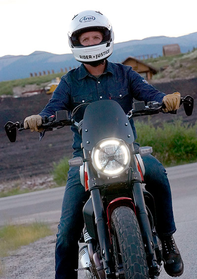 Scott O'Sullivan a riding motorcycle