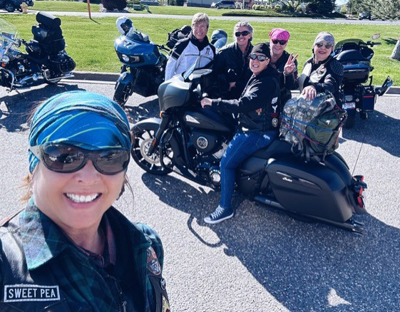 Audrey Paulus, AKA Sweet Pea, with a group of female motorcyclists