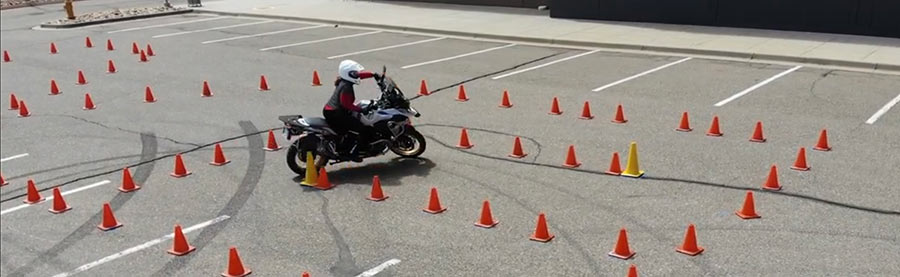 Kandi Spangler navigating between cones in a skills course