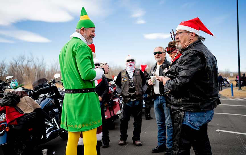 Riders in Christmas costumes lining up at the annual Toy Run for Children's Hospital