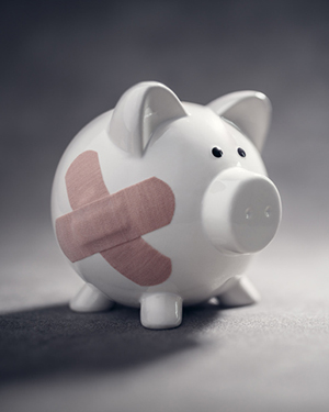 Piggy bank with band aids