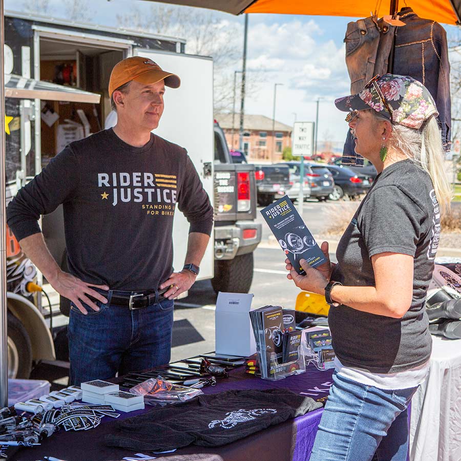 Scott O'Sullivan talking to a female rider